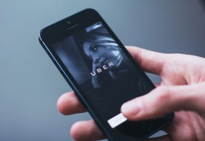 uber-cab-hand-iphone-34239